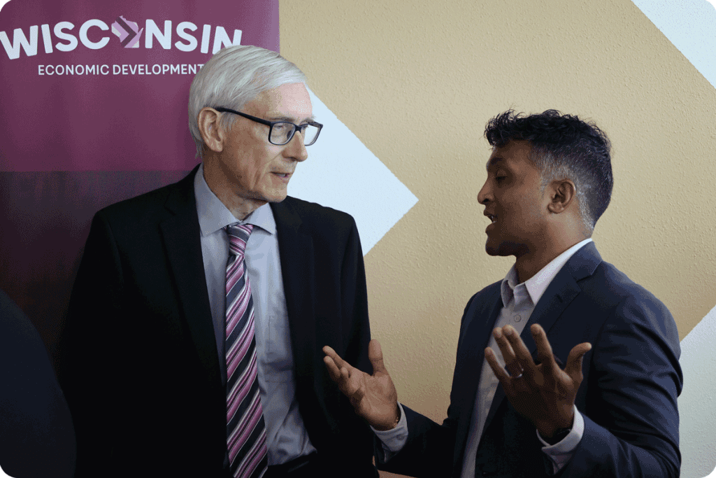Gov. Tony Evers and Vivek Swaminathan, CEO of Cardamom Health