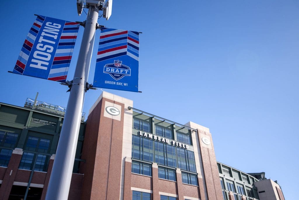 Banners for the upcoming NFL Draft are on display outside Lambeau Field on Thursday, Feb. 13, 2025, in Green Bay, Wis. Angela Major/WPR