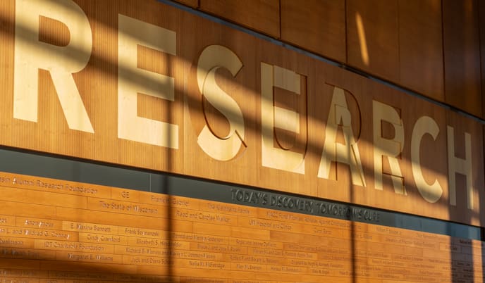 Faculty, staff and guests in the Wisconsin Institutes for Medical Research are greeted with the words “Research: Today’s Discovery, Tomorrow’s Cure.”